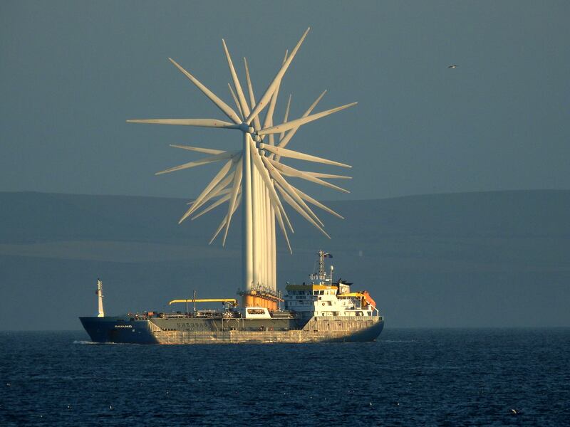 'LPG tanker 'Bayamo' leaving the River Tees and passing the EDF Teesside Wind Farm', by Tom Collins, is the Industry category highly commended image. PA