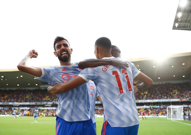 Mason Greenwood celebrates scoring for United with Bruno Fernandes and Aaron Wan-Bissaka. Reuters