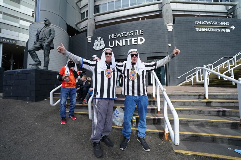Newcastle fans at St. James' Park ahead of the match against Tottenham Hotspur on Sunday, October 17. Newcastle play their first game under new ownership after the club was bought out last week by Saudi Arabia's sovereign wealth fund. AP