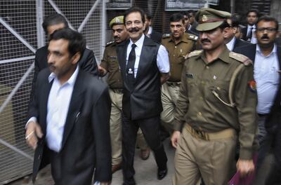 Sahara group chairman Subrata Roy escorted by police to a court in the northern Indian city of Lucknow. Reuters