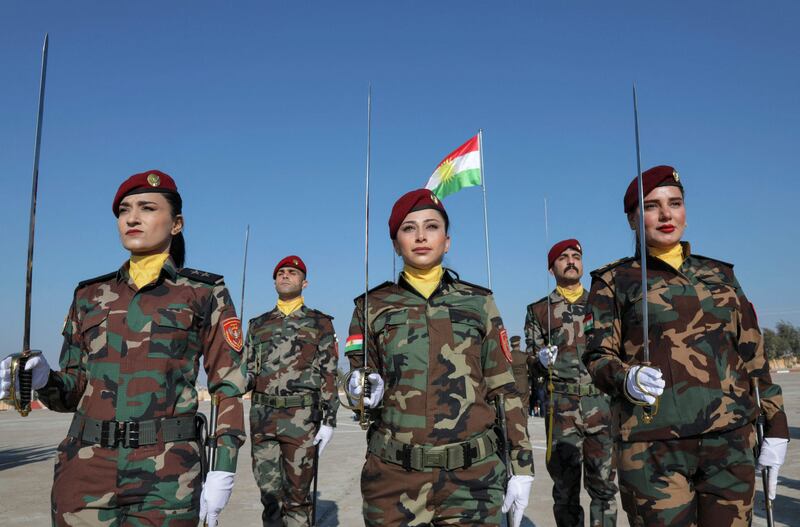 Iraqi-Kurdish Peshmerga officers graduate in Erbil, the capital of Iraq's autonomous Kurdish region. All photos: AFP