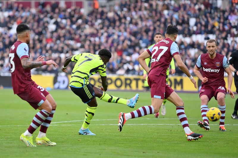 Bukayo Saka scores Arsenal's fifth goal. Getty Images