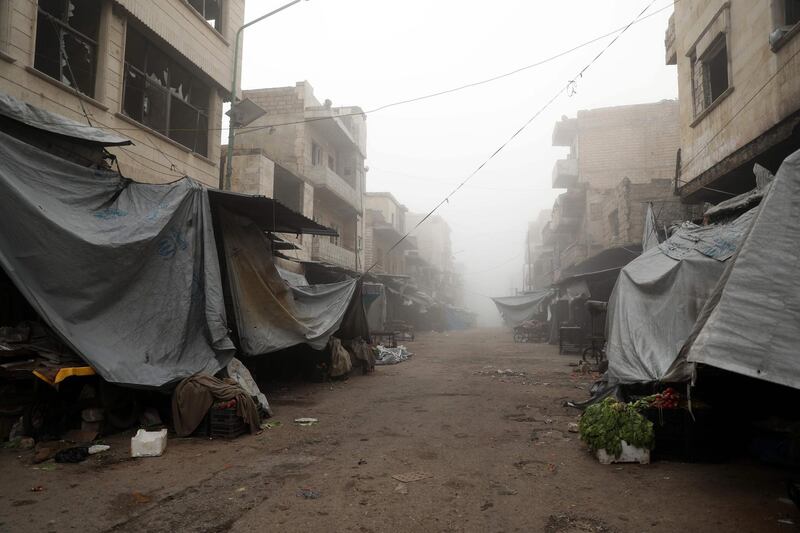 An empty market street in Maaret Al Numan.  AFP