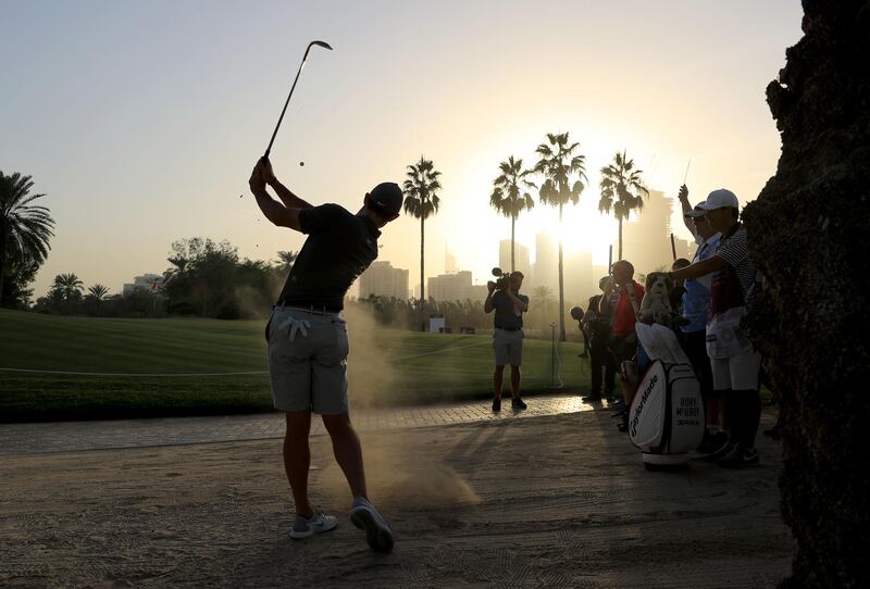 Rory McIlroy plays a shot during the pro-am at Emirates Golf Club. David Cannon / Getty Images