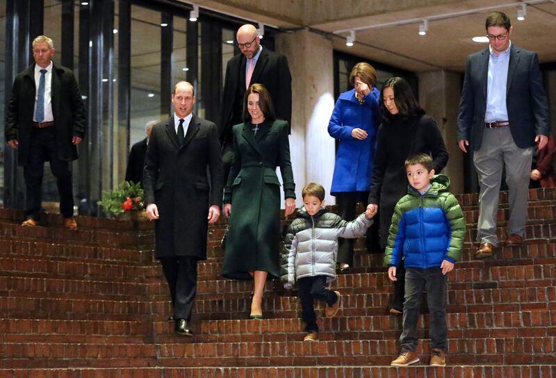 The Prince and Princess of Wales with Wu and her family. EPA