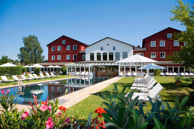A handout photo of the pool and flowers at Zur Bleiche Resort & Spa (Courtesy: Zur Bleiche Resort & Spa)