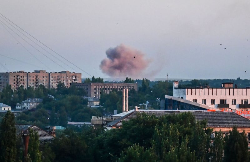 Smoke rises after shelling in Ukraine's breakaway enclave of Donetsk. AFP