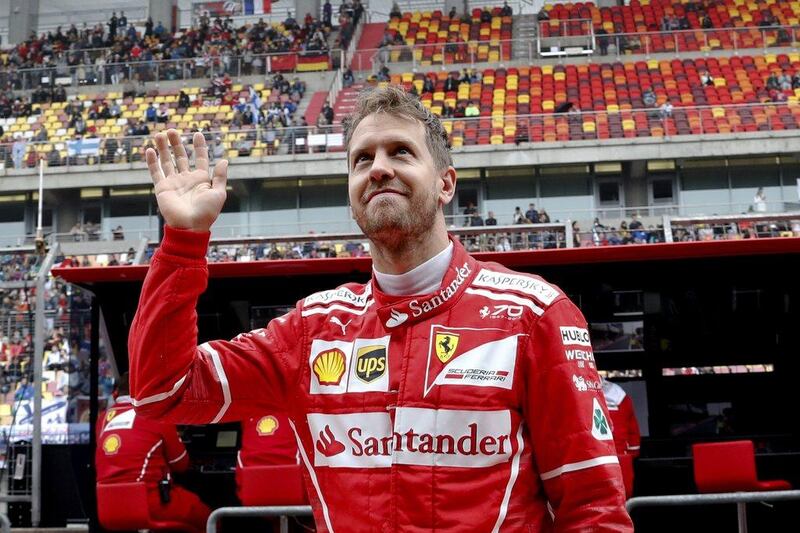 Ferrari driver Sebastian Vettel has the early championship lead after his victory in the Australian Grand Prix. Andy Wong / AP Photo