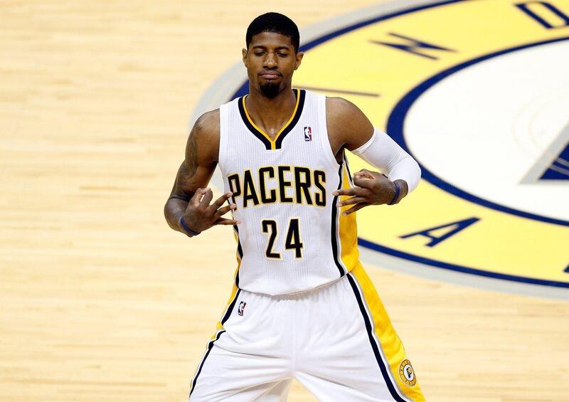 Paul George of the Indiana Pacers celebrates after hitting a three-point shot against the Miami Heat during Indiana's Game 5 win over Miami on Wednesday night. Miami still lead the best-of-seven series three games to two. Joe Robbins / Getty Images / AFP / May 28, 2014 