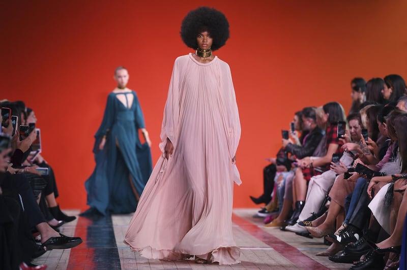 TOPSHOT - A model presents a creation by Elie Saab during the Women's Spring-Summer 2020 Ready-to-Wear collection fashion show at the Pavillon Ledoyen in Paris, on September 28, 2019. / AFP / Christophe ARCHAMBAULT
