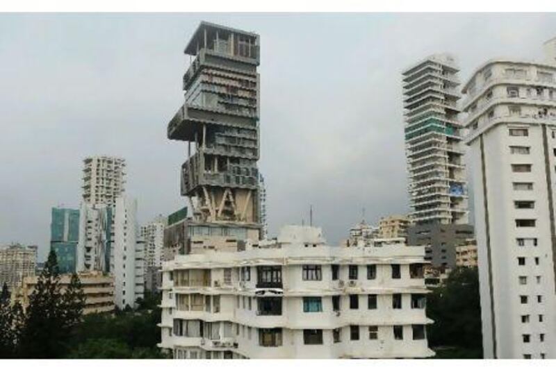 Mukesh Ambani's Mumbai home, known as Antilia, is said to be one of the most expensive private residences in the world. It is alleged that there were irregularities in the land deal, which could lead to an investigation into the affairs of the world's ninth richest man. Indranil Mukherjee / AFP