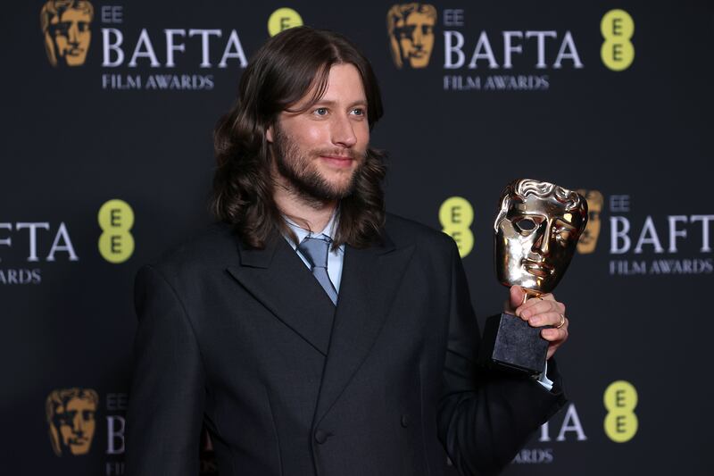 Ludwig Goransson poses with the Best Original Score Bafta. Getty Images