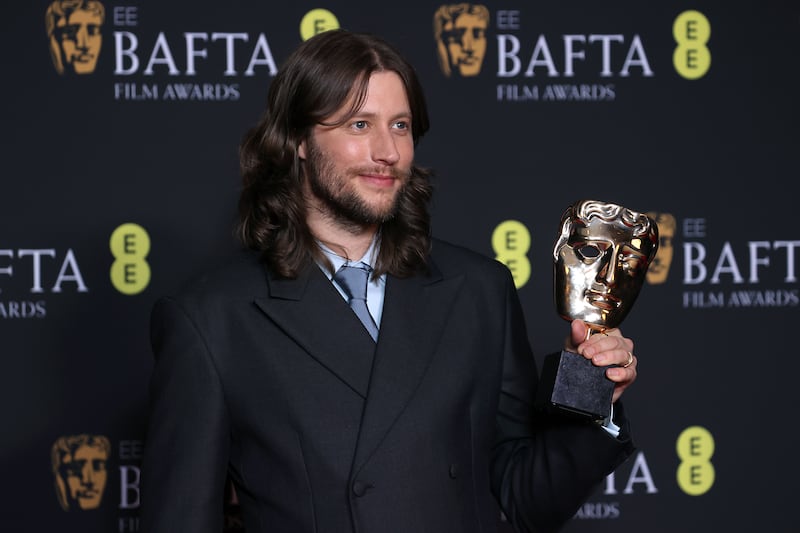 Ludwig Goransson poses with the Best Original Score Bafta. Getty Images