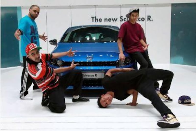 Hopefully, these breakdancers won't be the new salesemen in the Volkswagen dealership. Gabriela Maj / Bloomberg