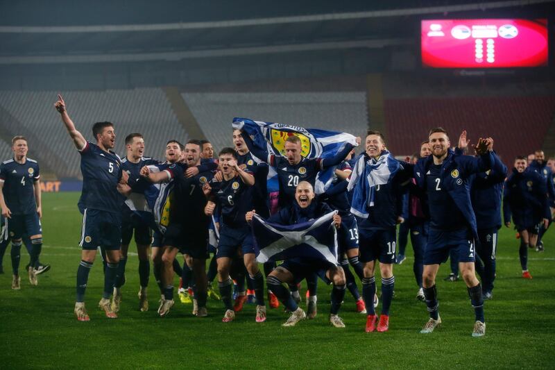 Scotland players celebrate victory. Getty