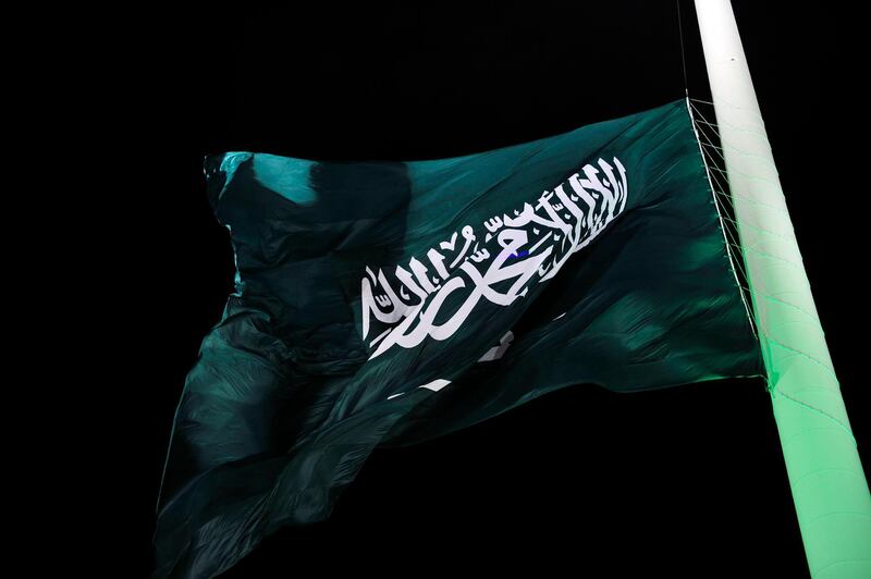 (FILES) In this file photo taken on September 23, 2014, the flag of  Saudi Arabia is hoisted onto the world's tallest flagpole in Jeddah.   The US Commission on International Religious Freedom on April 26, 2019, urged action against ally Saudi Arabia after its mass execution of 37 people, most of them Shiite Muslims. The Commission, whose members are appointed by the president and lawmakers across party lines but whose role is advisory, said the State Department "must stop giving a free pass" to Saudi Arabia.
 / AFP / STR
