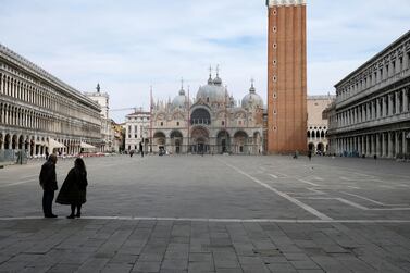 The almost empty St. Mark's Square is seen after the Italian government imposed a virtual lockdown on the north of Italy including Venice to try to contain a coronavirus outbreak, in Venice, Italy, March 9, 2020. REUTERS