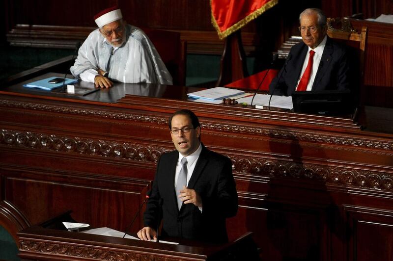 Tunisian Prime Minister Youssef Chahed at the Parliament in Tunis, Friday Aug. 26, 2016. (AP Photo/Riadh Dridi)