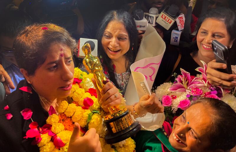Guneet Monga, producer of 'The Elephant Whisperers', is welcomed in Mumbai after winning the Oscar for the best short documentary. AP