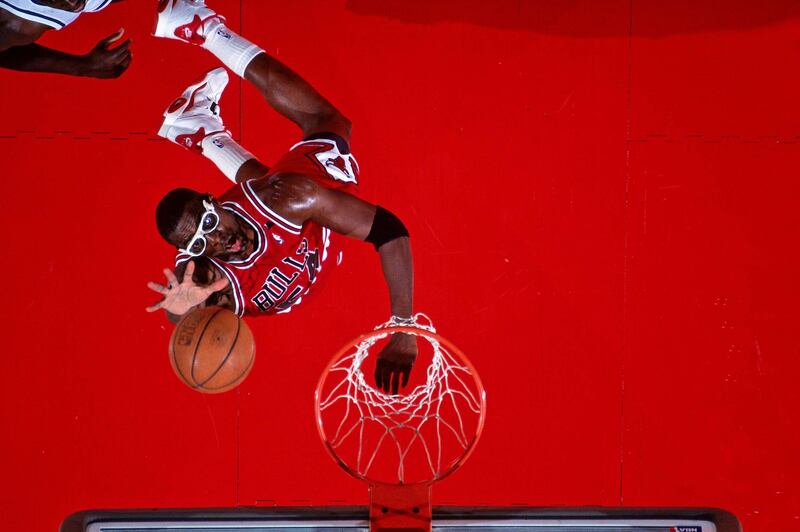 SACRAMENTO, CA - NOVEMBER 21: Horace Grant #54 of the Chicago Bulls rebounds against the Sacramento Kings on November 21, 1993 at Arco Arena in Sacramento, California. The Sacramento Kings defeated the Chicago Bulls 103-101. NOTE TO USER: User expressly acknowledges and agrees that, by downloading and or using this photograph, User is consenting to the terms and conditions of the Getty Images License Agreement. Mandatory Copyright Notice: Copyright 1993 NBAE (Photo by Rocky Widner/NBAE via Getty Images)