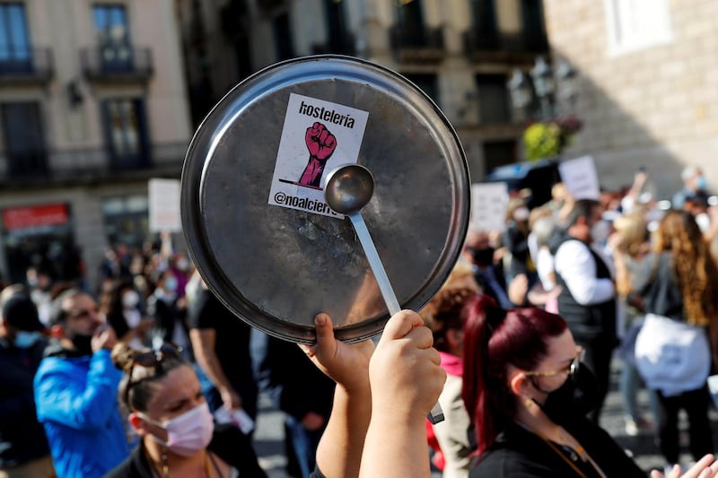 A sticker reading "Hospitality not at closing" is pictured during a protest in Barcelona, Spain. Reuters