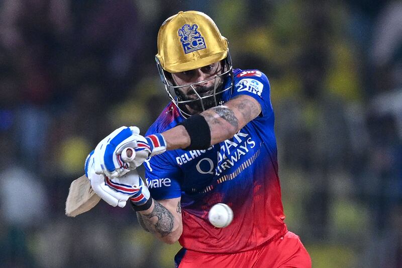 Royal Challengers Bangalore's Virat Kohli plays a shot on his way to a total of 21. AFP
