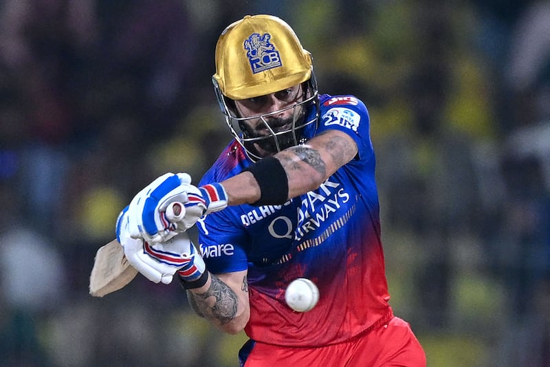 Royal Challengers Bangalore's Virat Kohli plays a shot on his way to a total of 21. AFP