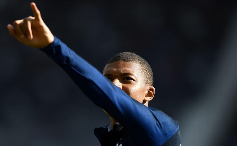 France's forward Kylian Mbappe gestures before a training session at the Municipal Stadium in Toulouse southern France, on September 2, 2017, on the eve of the of the FIFA World Cup 2018 qualifying football match against Luxembourg.  / AFP PHOTO / FRANCK FIFE