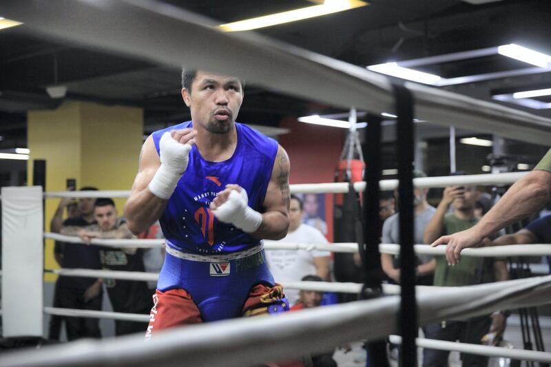 Eight-division boxing champion and Philippine Senator Manny Pacquiao trains for his upcoming fight against Adrien Broner at the Elorde Boxing Gym in Pasay City, Metro Manila.