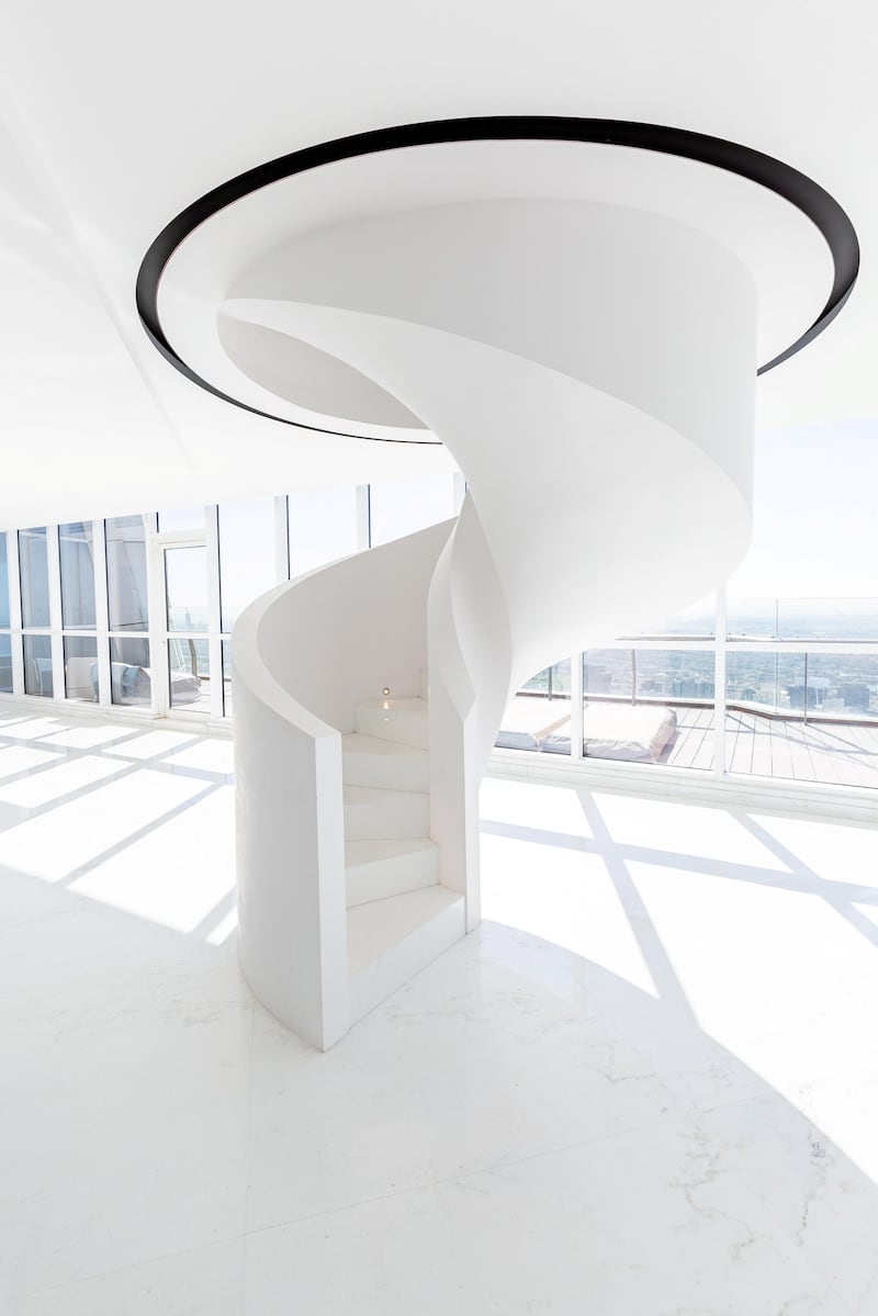 The Penthouse has been designed in minimalist, luxury style, and features a marble spiral staircase.
