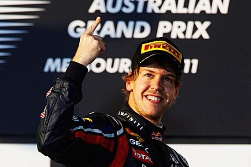 Sebastian Vettel, the Red Bull Racing driver, celebrates his Australian Grand Prix victory.