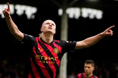 Manchester City's Erling Haaland celebrates after scoring the opening goal during the English Premier League soccer match between Fulham and Manchester City at Craven Cottage in London, Sunday, April 30, 2023.  (AP Photo / Kin Cheung)