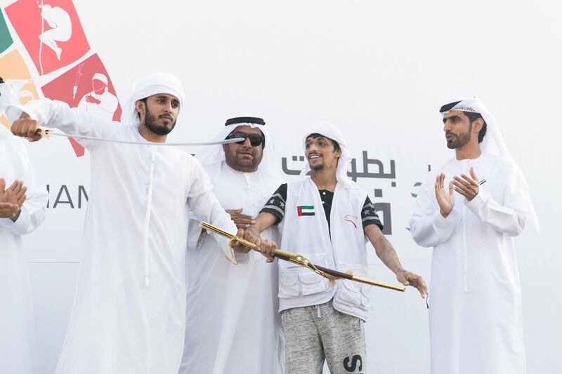 DUBAI, UNITED ARAB EMIRATES - DEC 3, 2017

Ghadayir Al Buloushi, 2nd to right, wins first place at the third edition of the National Day Camel Marathon. Organised by the Hamdan Bin Mohammed Heritage Centre, HHC, in co-operation with the Dubai Camel Racing Club, celebrates UAE’s 46th National Day, at Dubai International Endurance City, Saih Al Salam.

(Photo by Reem Mohammed/The National)

Reporter:  ANNA ZACHARIAS
Section: NA