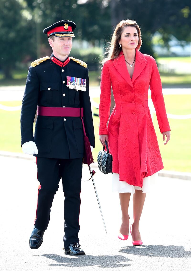 CAMBERLEY, ENGLAND - AUGUST 11: Queen Rania of Jordan (R) attends the Sovereign's Parade at the Royal Military Academy Sandhurst on August 11, 2017 in Camberley, England.  (Photo by Eamonn M. McCormack/Getty Images)