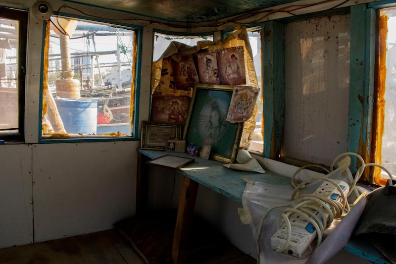 An abandoned cabin with a small altar that remains untouched. For most of the fishermen in Abu Dhabi’s ports, their lives revolve around the sea and each other. They work, eat, pray together