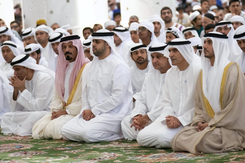 ABU DHABI, UNITED ARAB EMIRATES -June 15, 2018: HH Sheikh Theyab bin Mohamed bin Zayed Al Nahyan, Chairman of the Department of Transport, and Abu Dhabi Executive Council Member (4th L) and other dignitaries, attend Eid Al Fitr prayers at Sheikh Zayed Grand Mosque.

( Eissa Al Hammadi for Crown Prince Court - Abu Dhabi )
---
