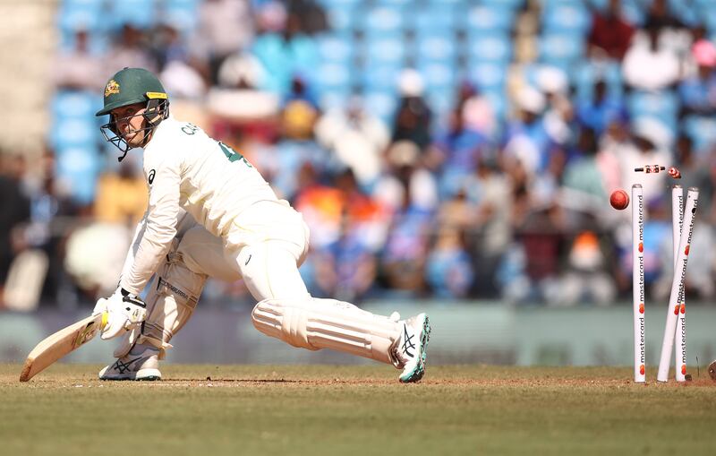 Alex Carey of Australia of Australia is bowled by Ravichandran Ashwin. Getty