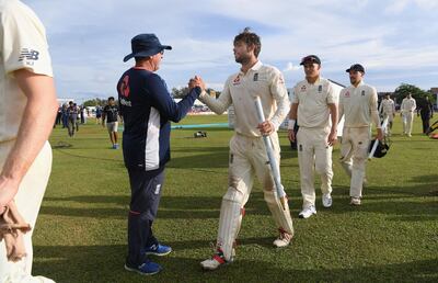 GALLE, SRI LANKA - NOVEMBER 09:  England wicketkeeper and man of the match Ben Foakes is congratulated by Coach Trevor Bayliss after Day Four of the First Test match between Sri Lanka and England at Galle International Stadium on November 9, 2018 in Galle, Sri Lanka.  (Photo by Stu Forster/Getty Images)