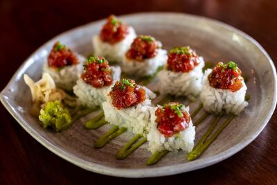 A matsuri roll of spicy tuna with jalapeno sauce and avocado from 99 Sushi