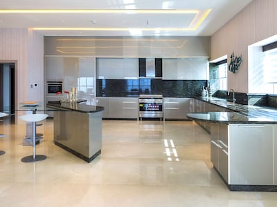 A modern open-plan kitchen. Photo: Luxhabitat Sotheby's International Realty