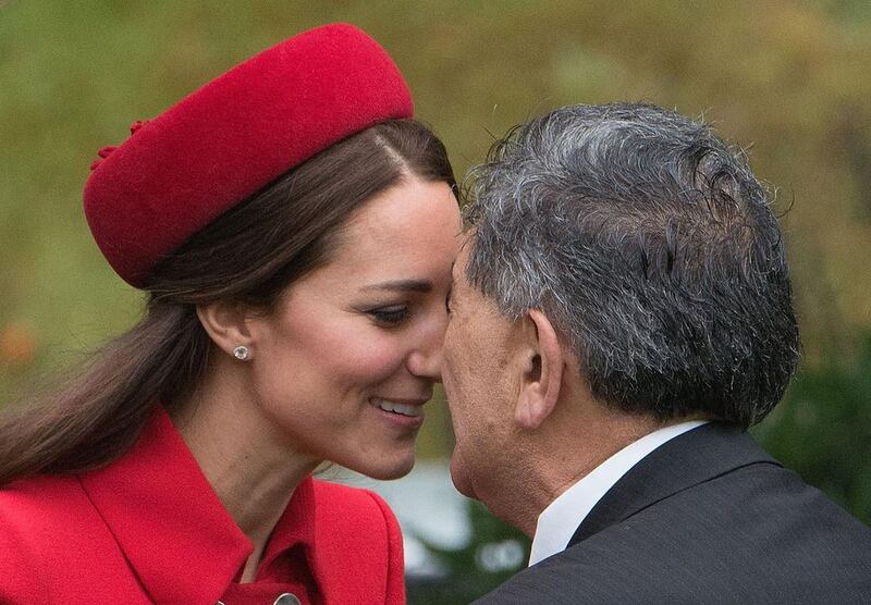 Catherine, the Duchess of Cambridge, receives a "hongi", a traditional Maori greeting, by a Maori elder. AFP