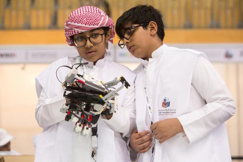 Acquiring new abilities such as mastering the technology on show at the World Robot Olympiad is critical for young Emiratis if they are to compete. Christopher Pike / The National