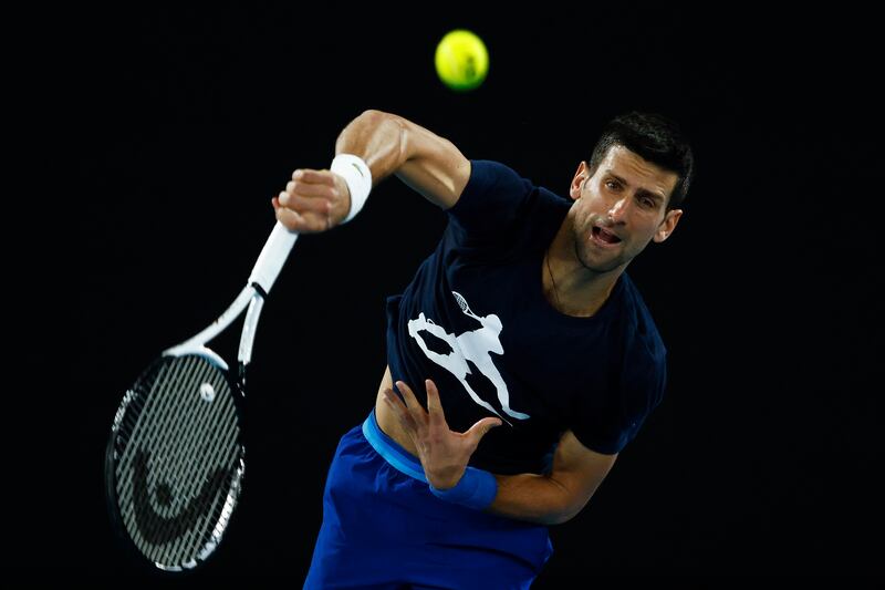 Novak Djokov hits a serve during a practice session ahead of the 2022 Australian Open at Melbourne Park. Getty Images