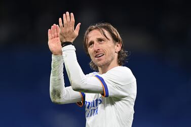 MADRID, SPAIN - APRIL 12:  Luka Modric of Real Madrid acknowledges the crowd after the UEFA Champions League Quarter Final Leg Two match between Real Madrid and Chelsea FC at Estadio Santiago Bernabeu on April 12, 2022 in Madrid, Spain. (Photo by Shaun Botterill / Getty Images)