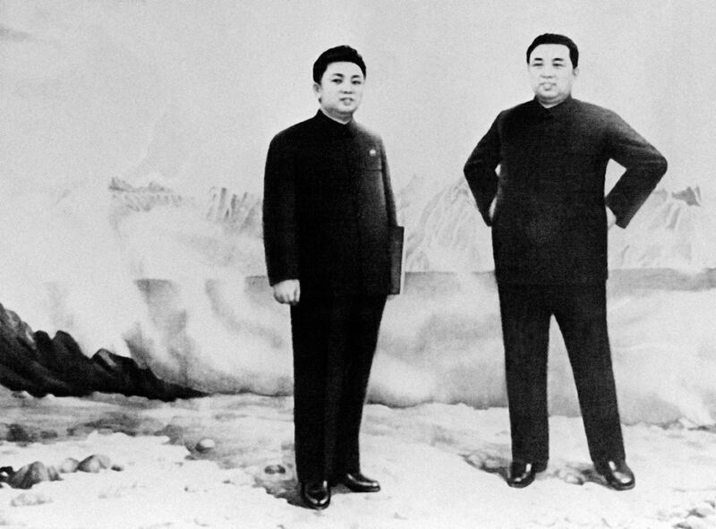 Kim Il-sung with his son and chosen successor, Kim Jong-il in November 1986. KCNA / AFP