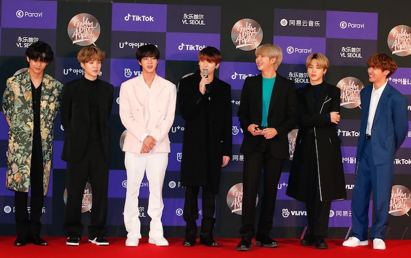 epa08103914 Members of South Korean boy band 'Bangtan Boys, BTS' speak for the 34st annual Golden Disk Awards ceremony at the Gocheok Sky Dome in Seoul, South Korea, 05 January 2020. The Golden Disc Awards is recognized as the most traditional music awards ceremony in South Korea, with an award ceremony to select the best albums, singers and producers in the Korean pop scene.  EPA/KIM HEE-CHUL