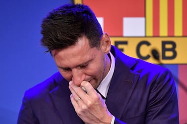 Barcelona's Argentinian forward Lionel Messi cries during a press conference at the Camp Nou stadium in Barcelona on August 8, 2021.  - Messi fought back tears as he began a press conference at which he confirmed he is leaving Barcelona, where he has played his entire career.  (Photo by Pau BARRENA  /  AFP)