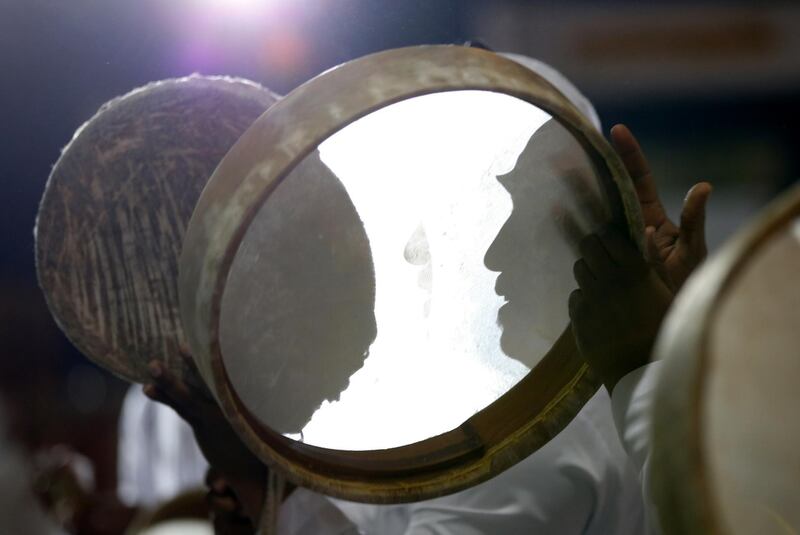 Emirati dancers perform a traditional folklore dance on the opening day of the Liwa Date Festival.  EPA