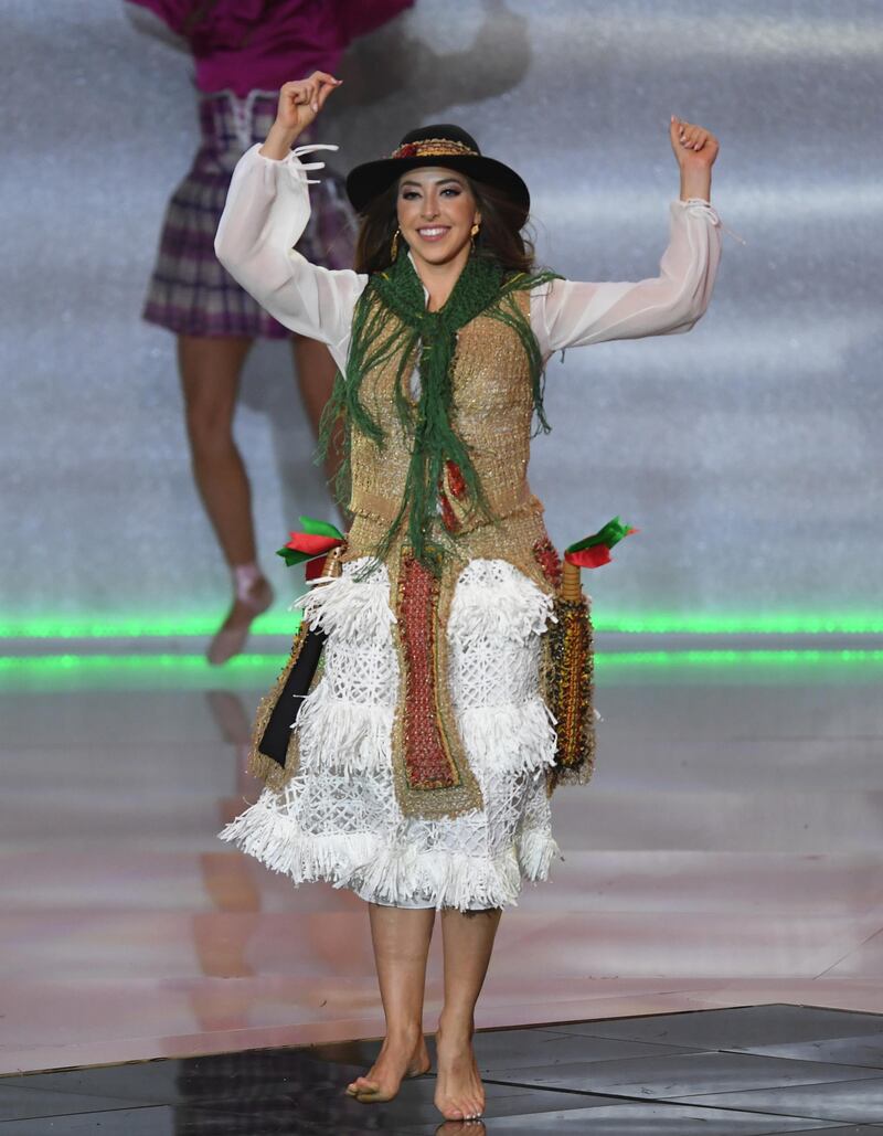 Miss Portugal Ines Brusselmans performs during the Miss World 2019 final.  EPA