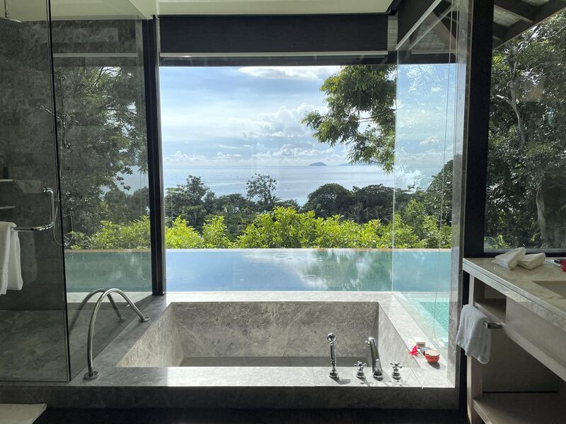 A marble bathtub with ocean views at Four Seasons Resort Seychelles. Janice Rodrigues / The National